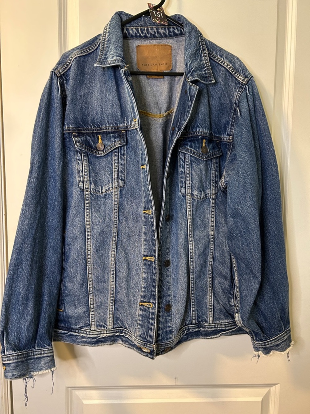 131. American Eagle Light Blue Denim Jacket with Brown Leather Patch